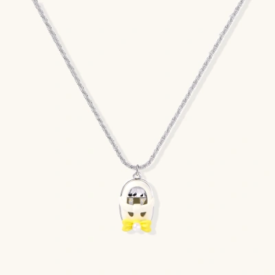 Chrome egg-shaped pendant with kawaii face, yellow bow, and pearl detail on silver chain against white background