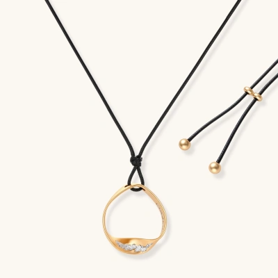 Geometric circle pendant necklace with crystal cluster on adjustable black cord, available in gold and silver finishes.