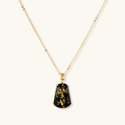 18k gold-plated necklace and earrings with green amber pendants featuring golden inclusions on cream background