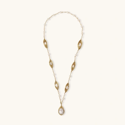 14K gold plated necklace with organic leaf motifs and freshwater pearls arranged in an elegant chain design on neutral background.