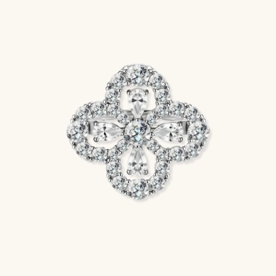 Adjustable sterling silver ring with quatrefoil design featuring brilliant moissanite stones in clover pattern