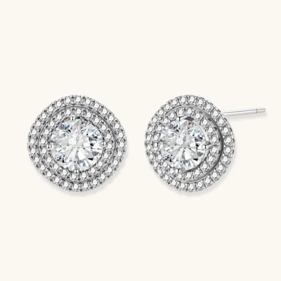 Double halo sterling silver stud earrings with brilliant round moissanite center stones and pavé crystal accents
