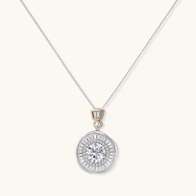 Sterling silver necklace with circular geometric pendant featuring central moissanite and radial baguette pattern.