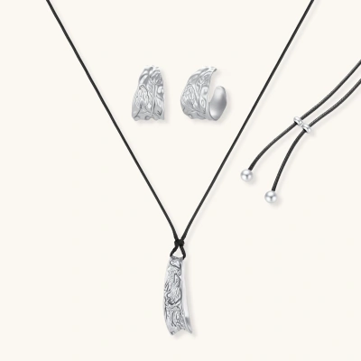 Textured silver jewelry set with floral engravings featuring adjustable cord necklace and matching hoop earrings