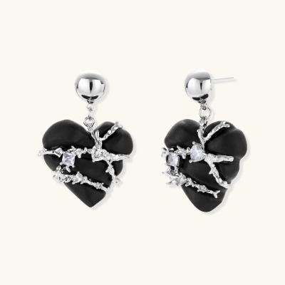 Black heart-shaped wood earrings with decorative silver chains and crystal accents hanging from silver ball studs