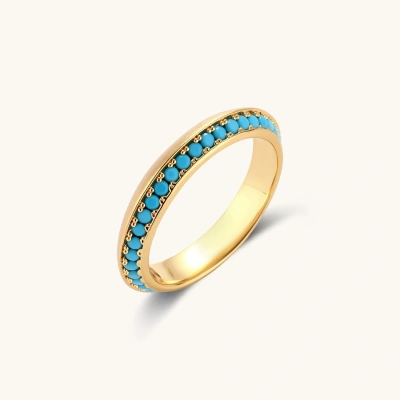 Gold-plated ring with row of blue malachite stones set in geometric pattern on neutral background.