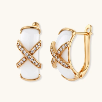 White ceramic huggie hoop earrings with 18K gold-plated X cross detail pavé-set with clear zircon stones.