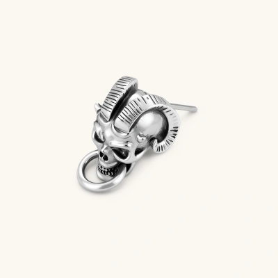 Silver 316L stainless steel stud earring shaped as a horned demon skull with ram horns and a dangling mouth ring.