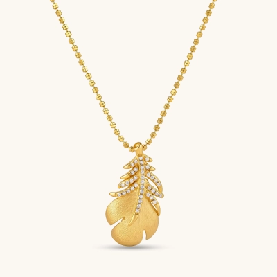 18K gold-plated 925 silver leaf pendant with brushed finish and cubic zirconia accents on a beaded ball chain.