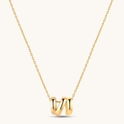 18K gold-plated 925 sterling silver letter N pendant on a delicate adjustable cable chain, cream background.