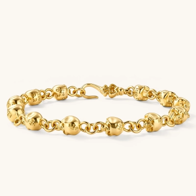 24K gold plated sterling silver bracelet with polished skull beads on a rolo chain link, hook-and-eye clasp, 200mm length.