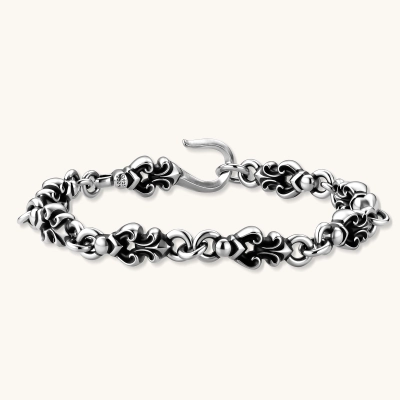 925 sterling silver bracelet with oxidized fleur-de-lis links, round ball connectors, hook clasp, 200mm length.