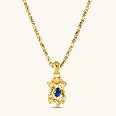 Gold-plated 925 silver spider web pendant with oval blue sapphire stone on a box chain, 37mm long.