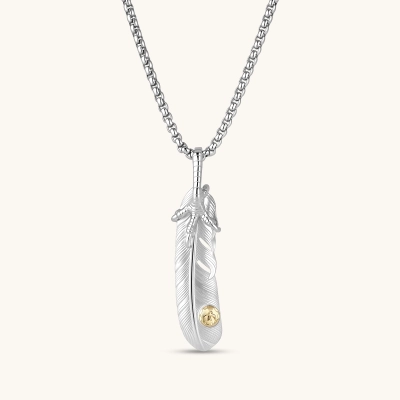Sterling silver feather pendant with engraved quill texture, gold-tone rivet detail, talon wrap accent, on a box chain.