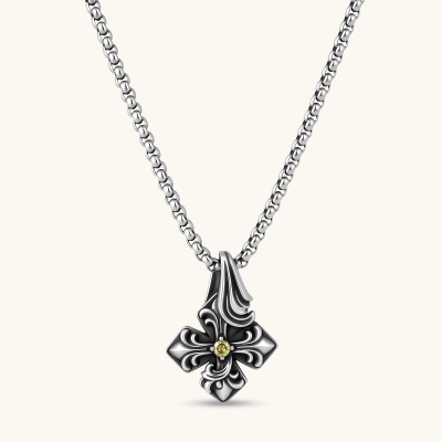 Sterling silver oxidized fleur-de-lis cross pendant with yellow gemstone center on a box chain, 36mm drop.