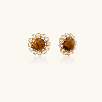 Gold-plated stud earrings with cushion-cut tiger's eye stones surrounded by pearl halos on white background.