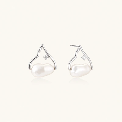 Silver mountain outline studs with baroque pearl and diamond accent on white background
