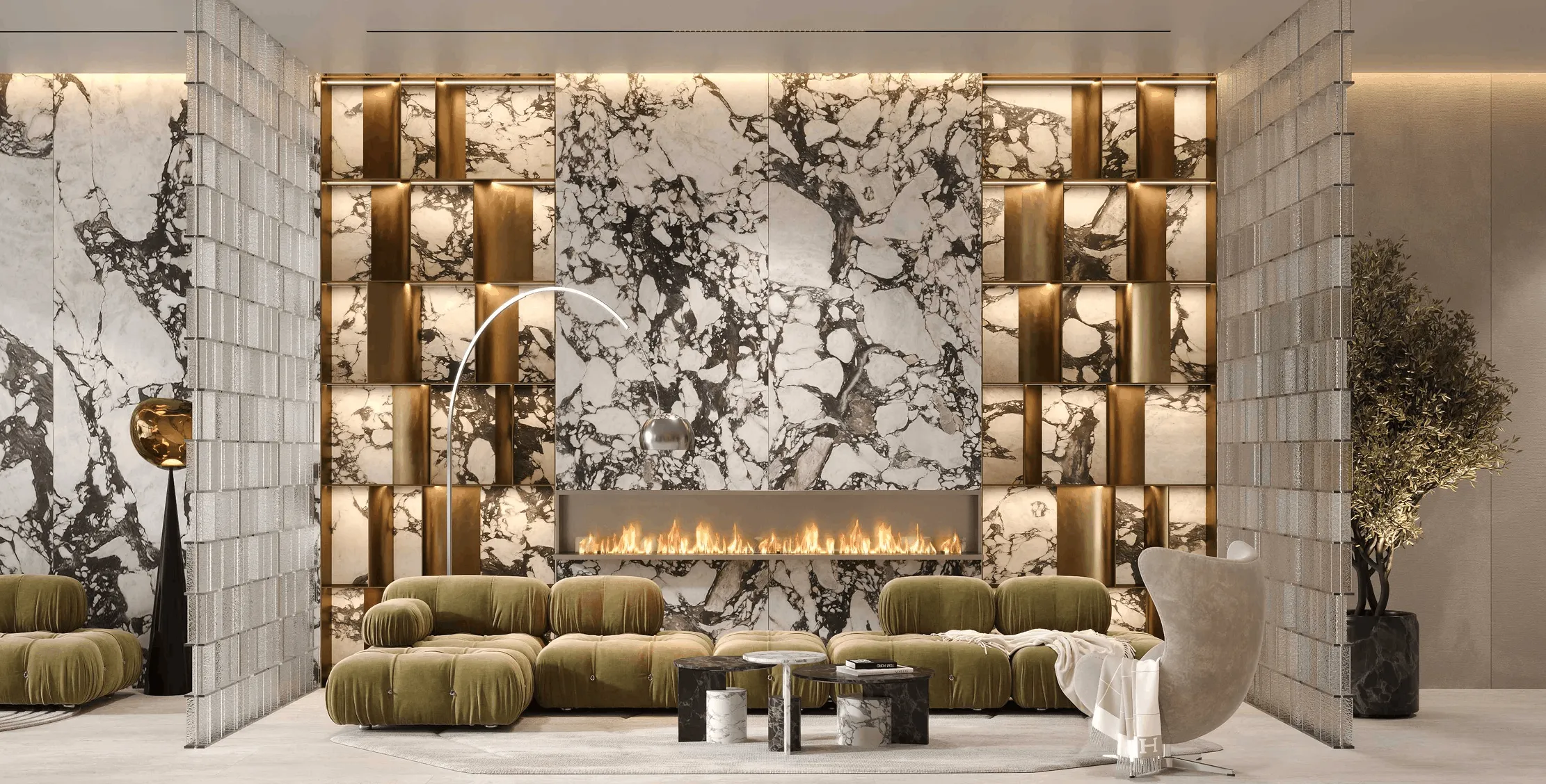 Modern living room with olive green modular sofa, marble fireplace wall, gold accents, and beige armchair with throw.