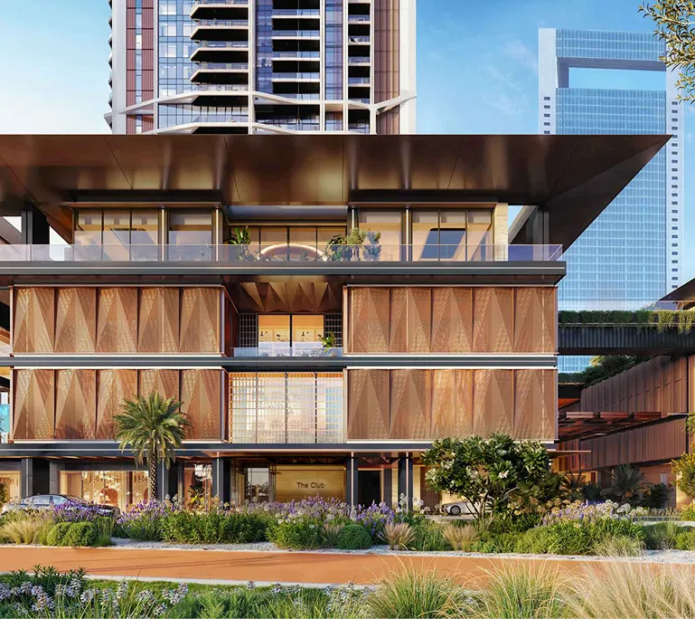 Modern multi-story building with a large overhanging roof, balcony, vertical wooden panels, lush landscaping, and a sign that reads 'The Club'.