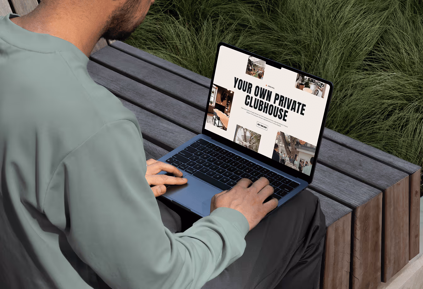 Poster on a concrete wall with text 'PAW CLUB EAT PLAY LOVE' and small icons of a dog bone, food bowl, and heart, with a blurred dog in the foreground.