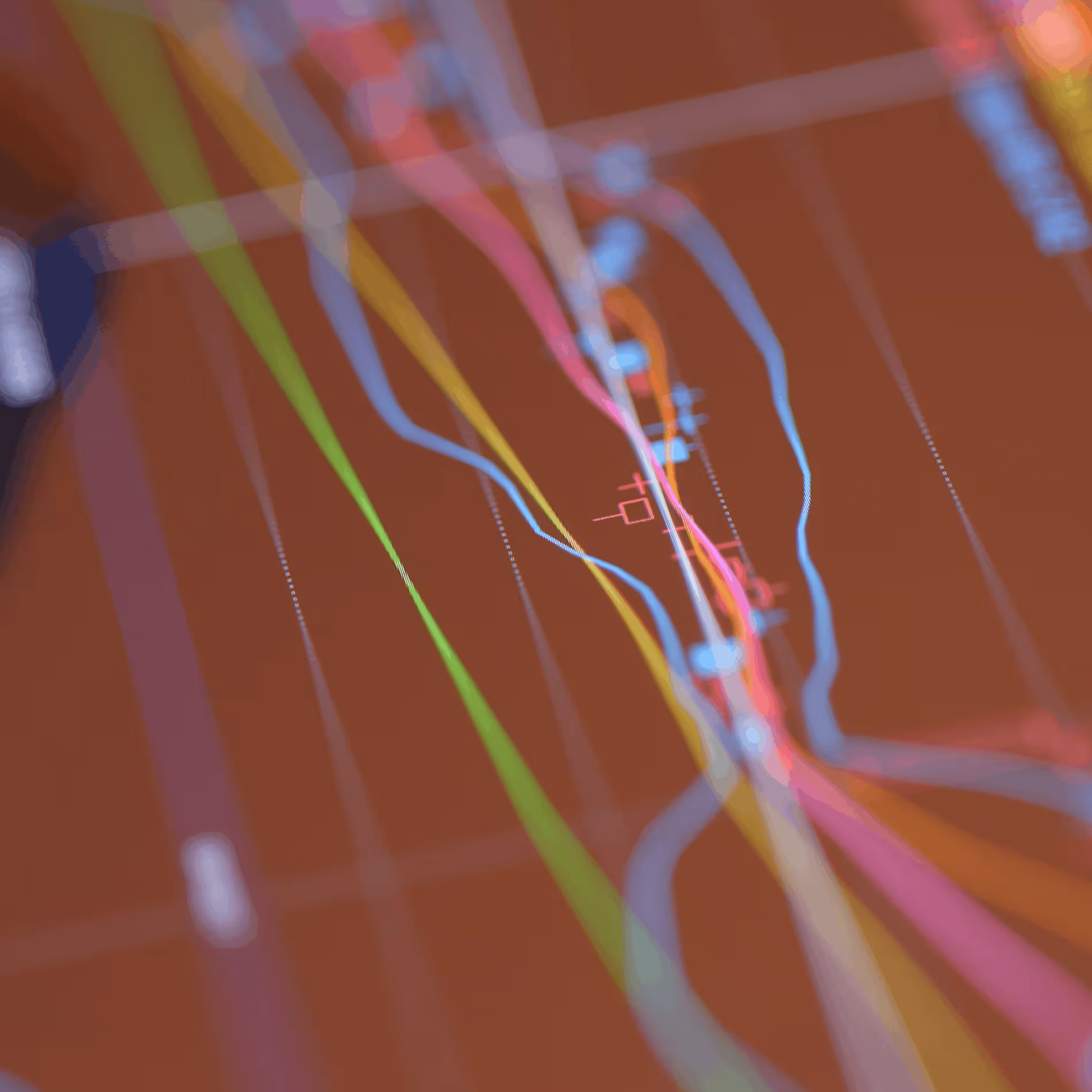 Graphique coloré avec plusieurs courbes ondulées sur fond rouge montrant des données fluctuantes.
