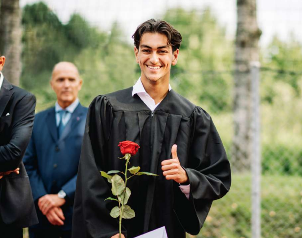 Student graduating from the International Baccalaureate in Lausanne.