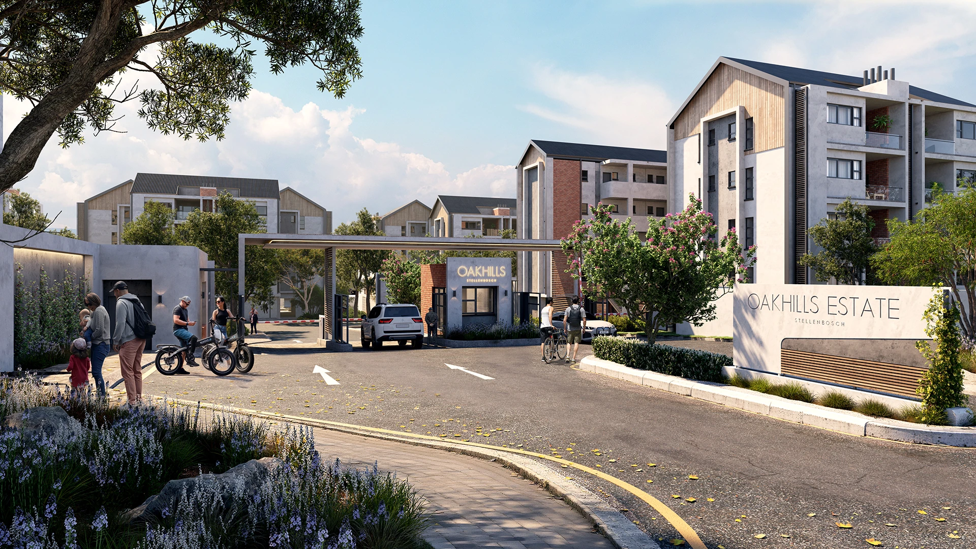Entrance to Oakhills Estate Stellenbosch with people walking, biking, cars entering, and modern residential buildings in the background.