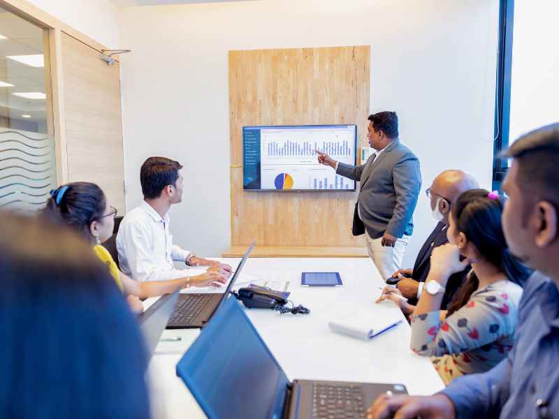 Property management team evaluating vendor procurement data