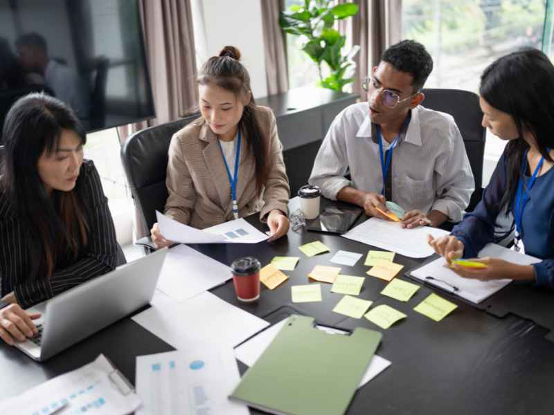 Property management team evaluating vendor management platform options across vendors
