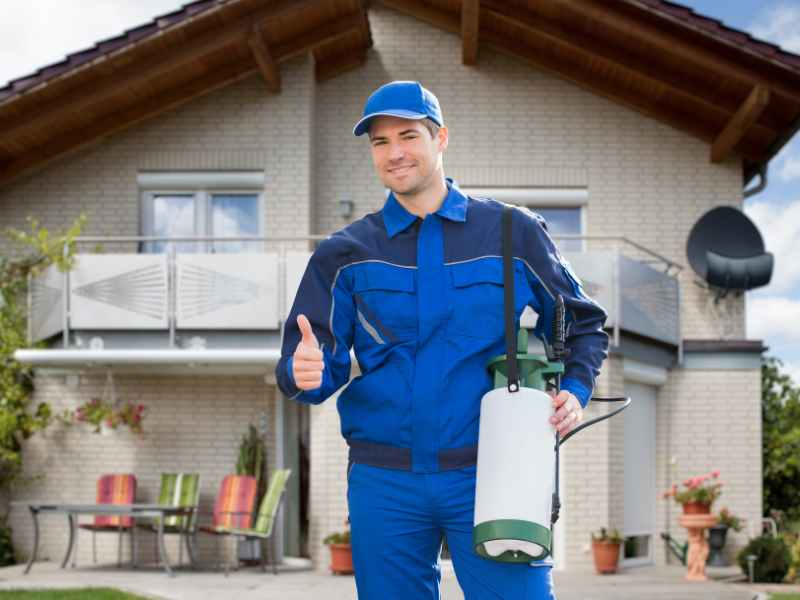 Uniformed maintenance contractor working on-site at a managed property, the point where vendor compliance matters most.