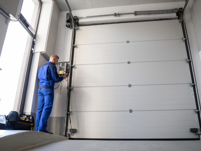 A maintenance contractor working in a self-storage facility, illustrating self-storage vendor screening in action.