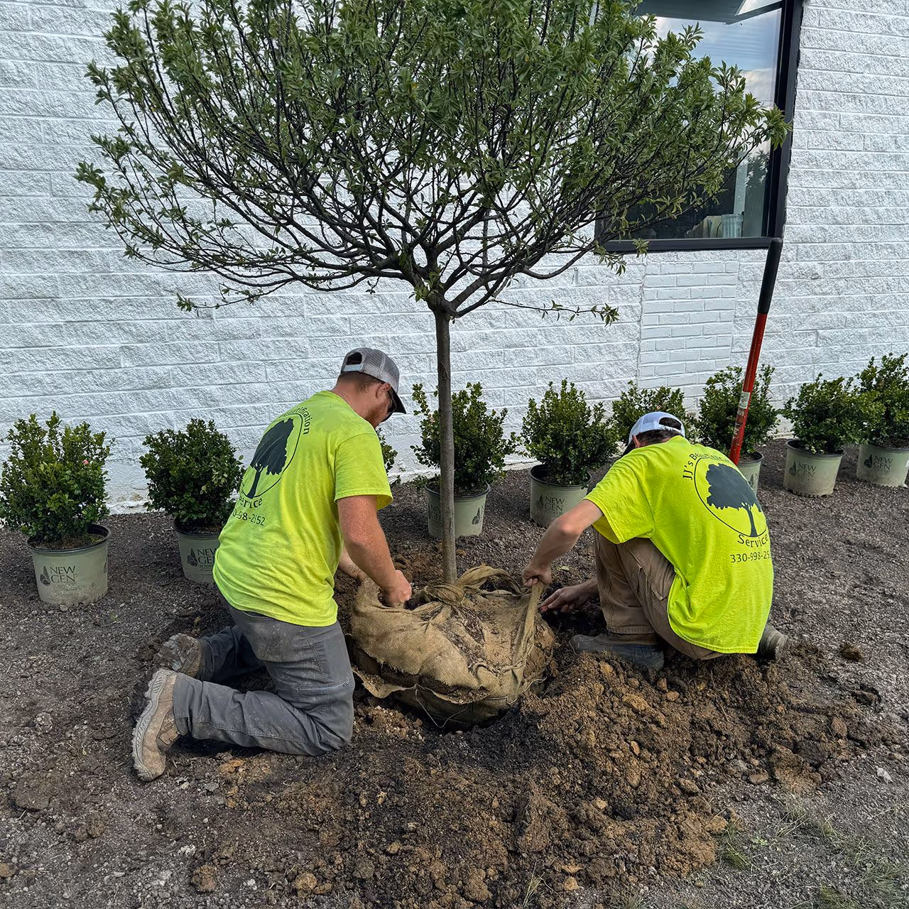 JJS Beautification Services crew performing HOA landscape maintenance