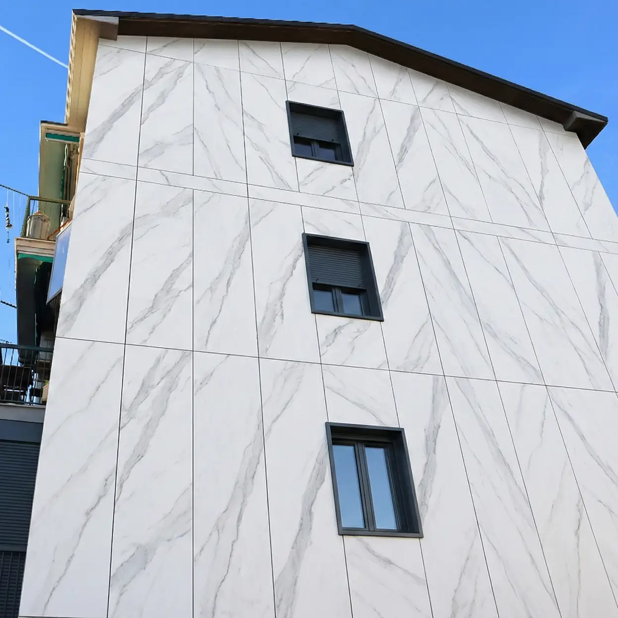 Risultato finale di riqualificazione energetica con facciata ventilata ed estetica moderna nel Centro Italia - SPR