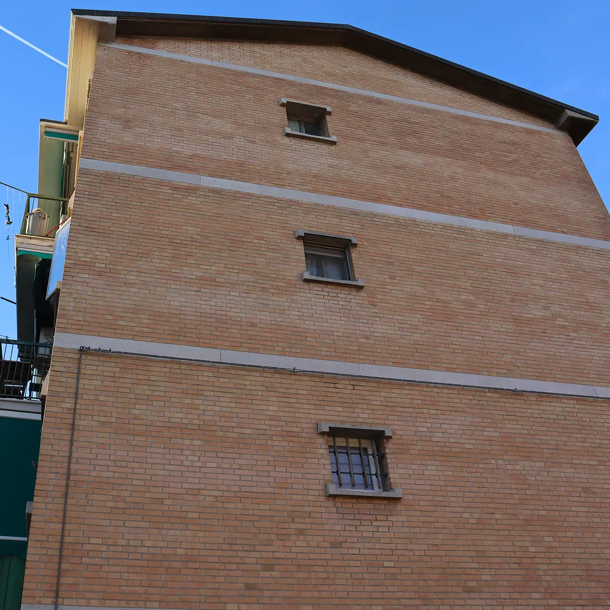 Intervento di efficientamento energetico su edificio residenziale in mattoni nel Centro Italia - SPR