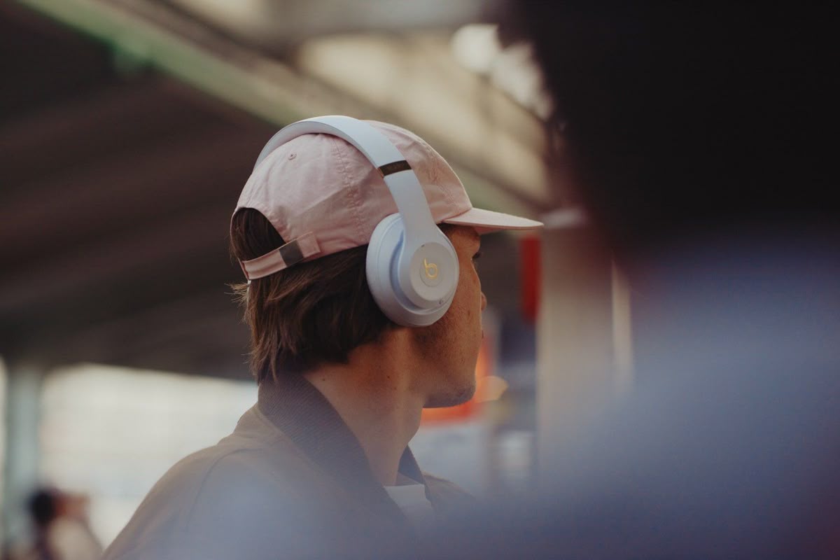 Man with headphones in the metro.