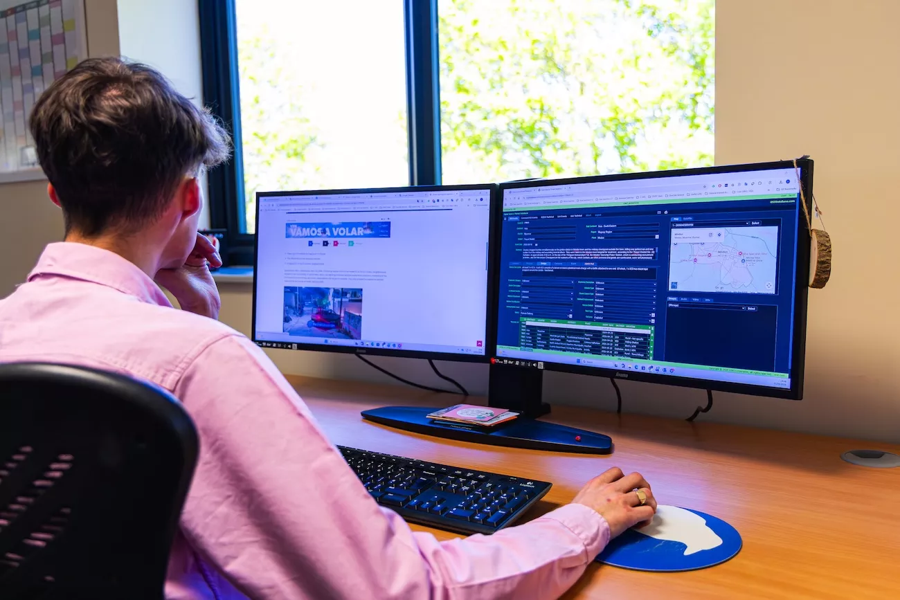 Risk analyst cross-referencing open source intelligence with the OSTD threat database during a risk assessment