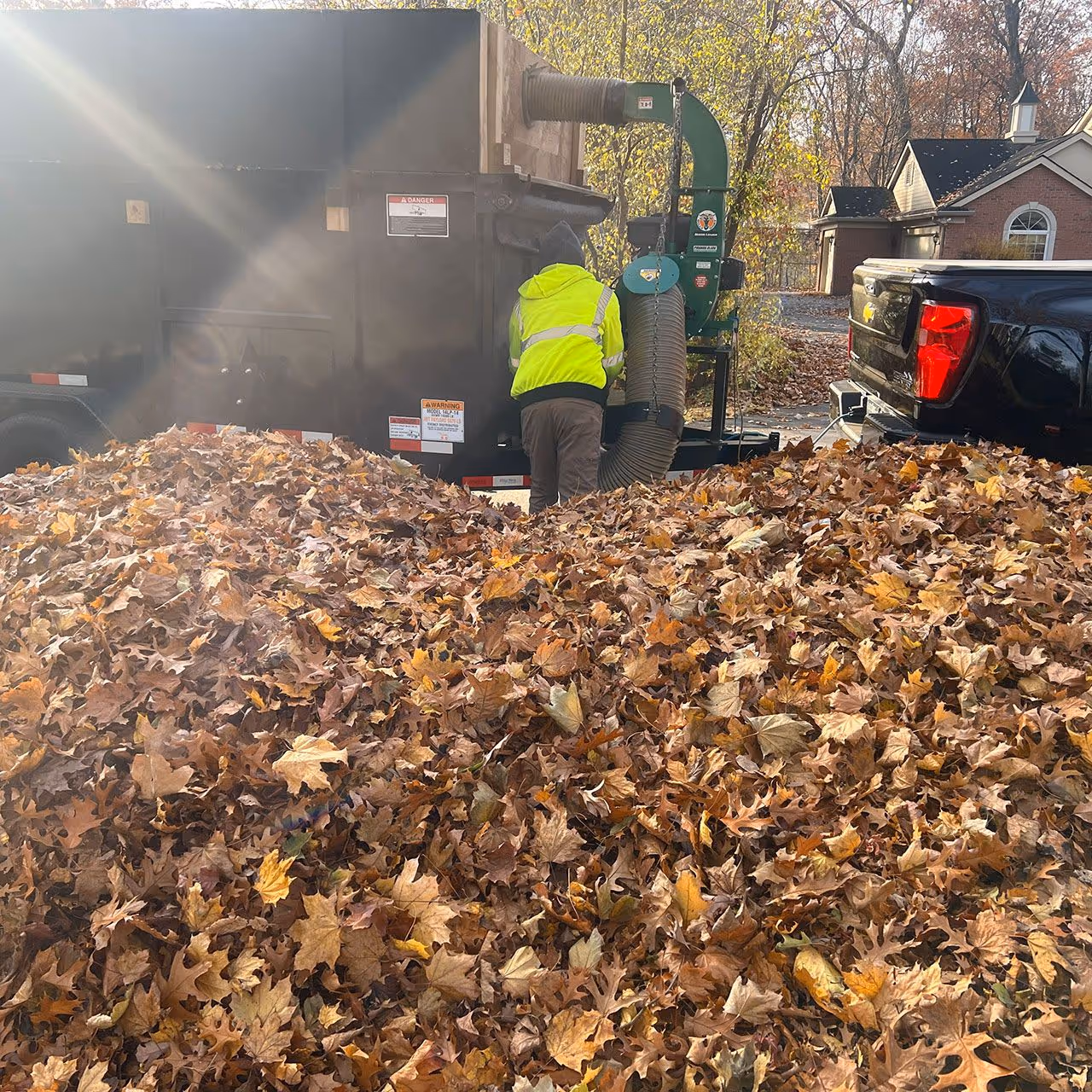 Seasonal landscaping cleanup for a residential property in West Bloomfield, Michigan