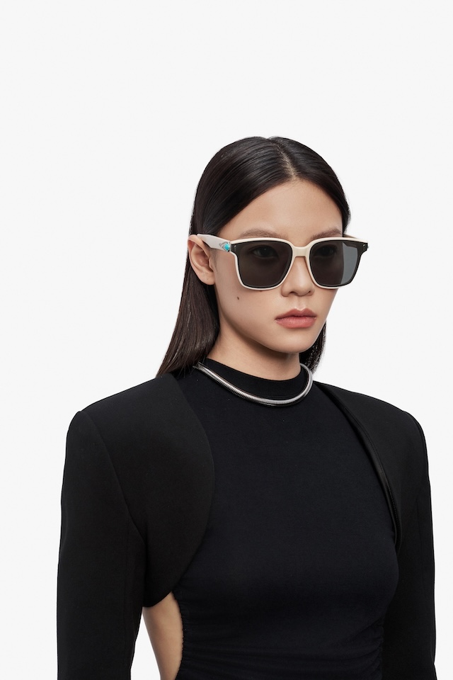 [background image] a happy customer getting new glasses (for a optician store and optometry clinic)