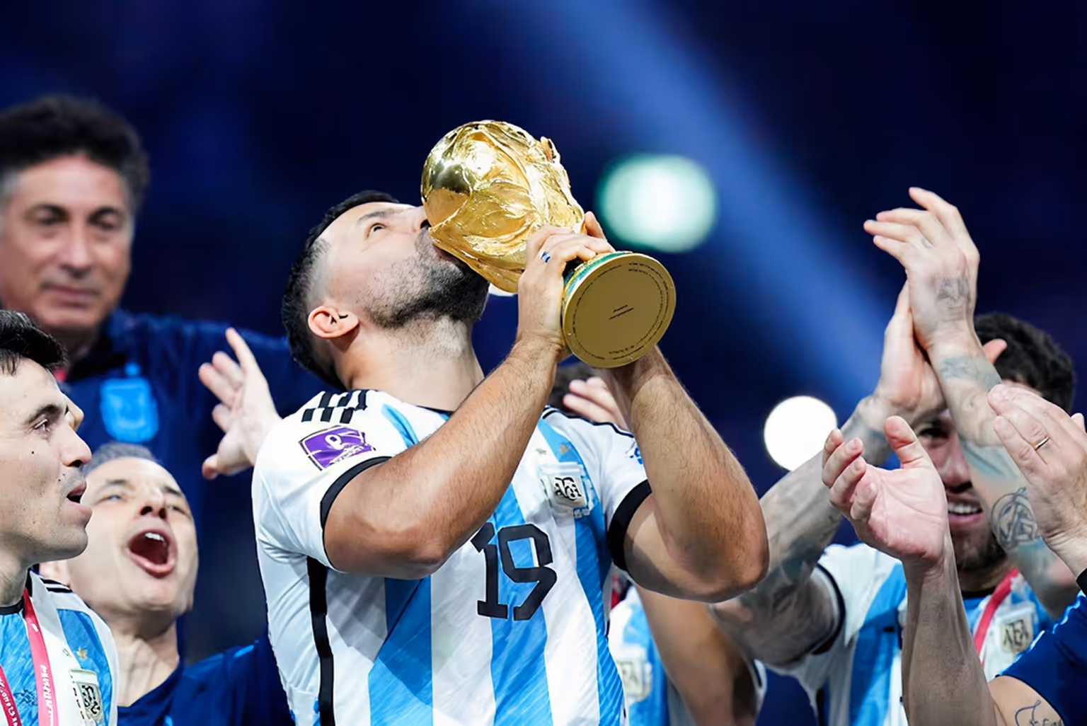 Former Argentina forward Sergio Aguero holds the trophy after Argentina won the World Cup final soccer match between Argentina and France at the Lusail Stadium in Lusail, Qatar, Sunday, Dec. 18, 2022.