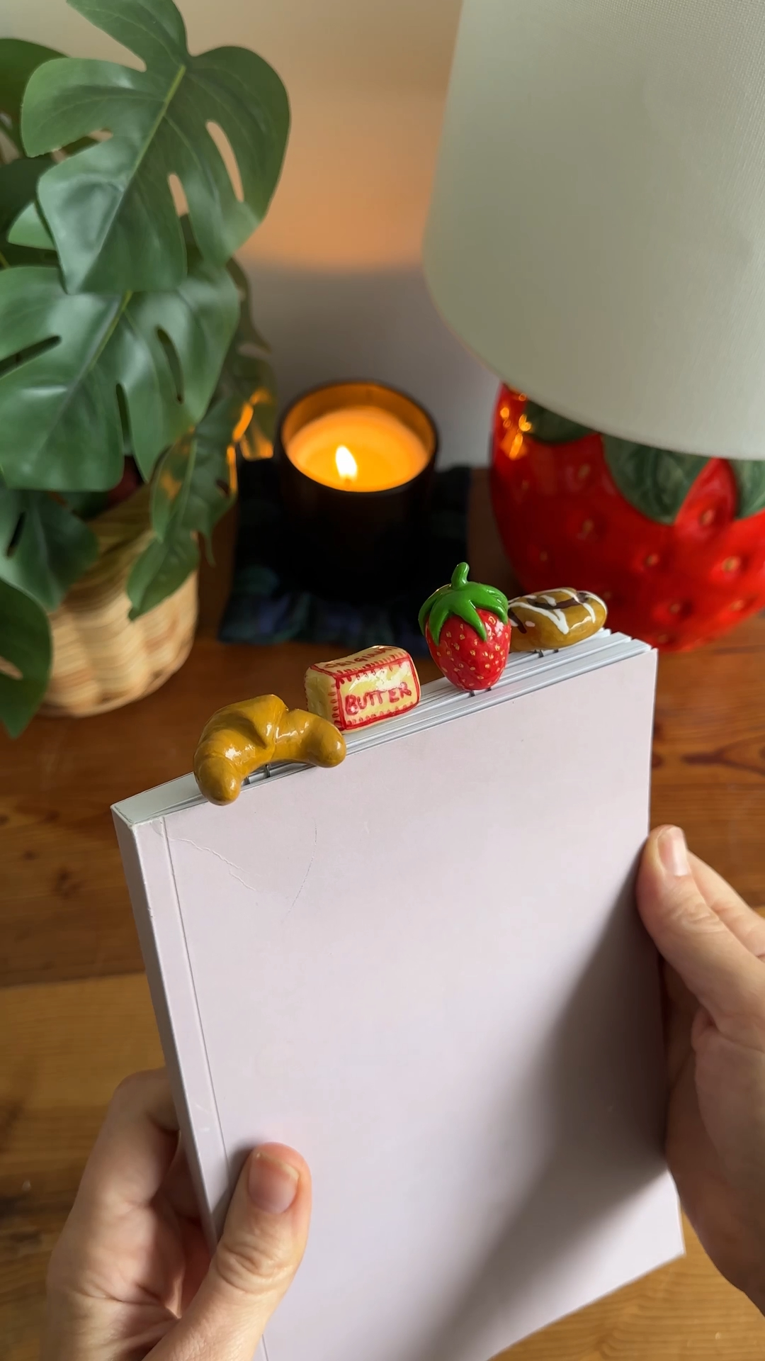 finished polymer clay food bookmarks attached to paper clips with glossy finish