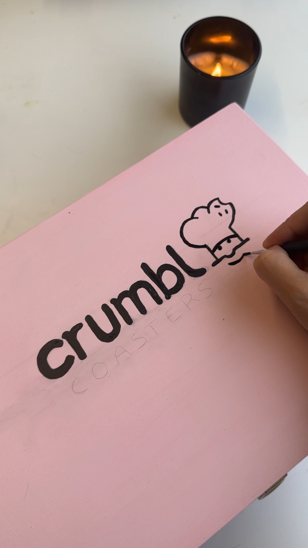 hand painting a wooden box pink for a cookie coaster gift box