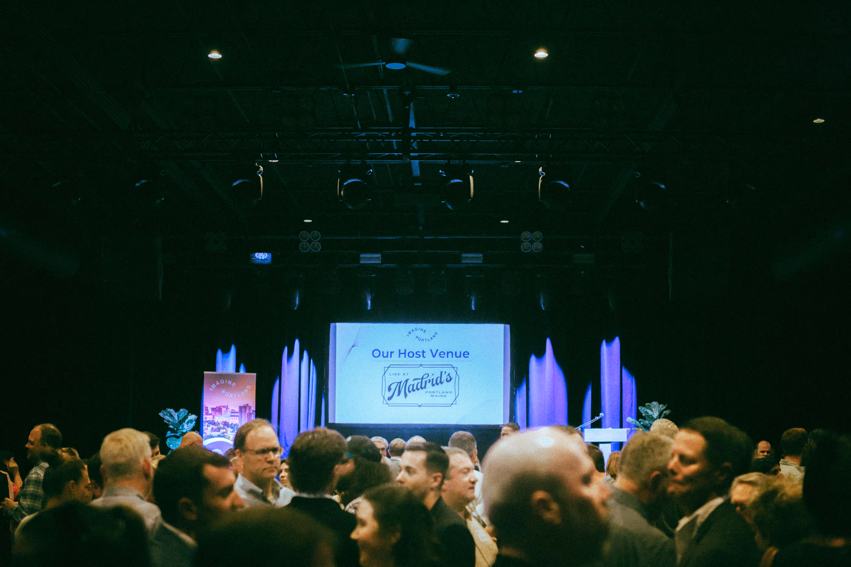 Corporate event crowd gathered in the hall at Live at Madrid's