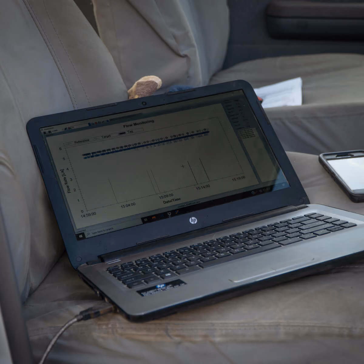 Laptop displaying a monitoring interface