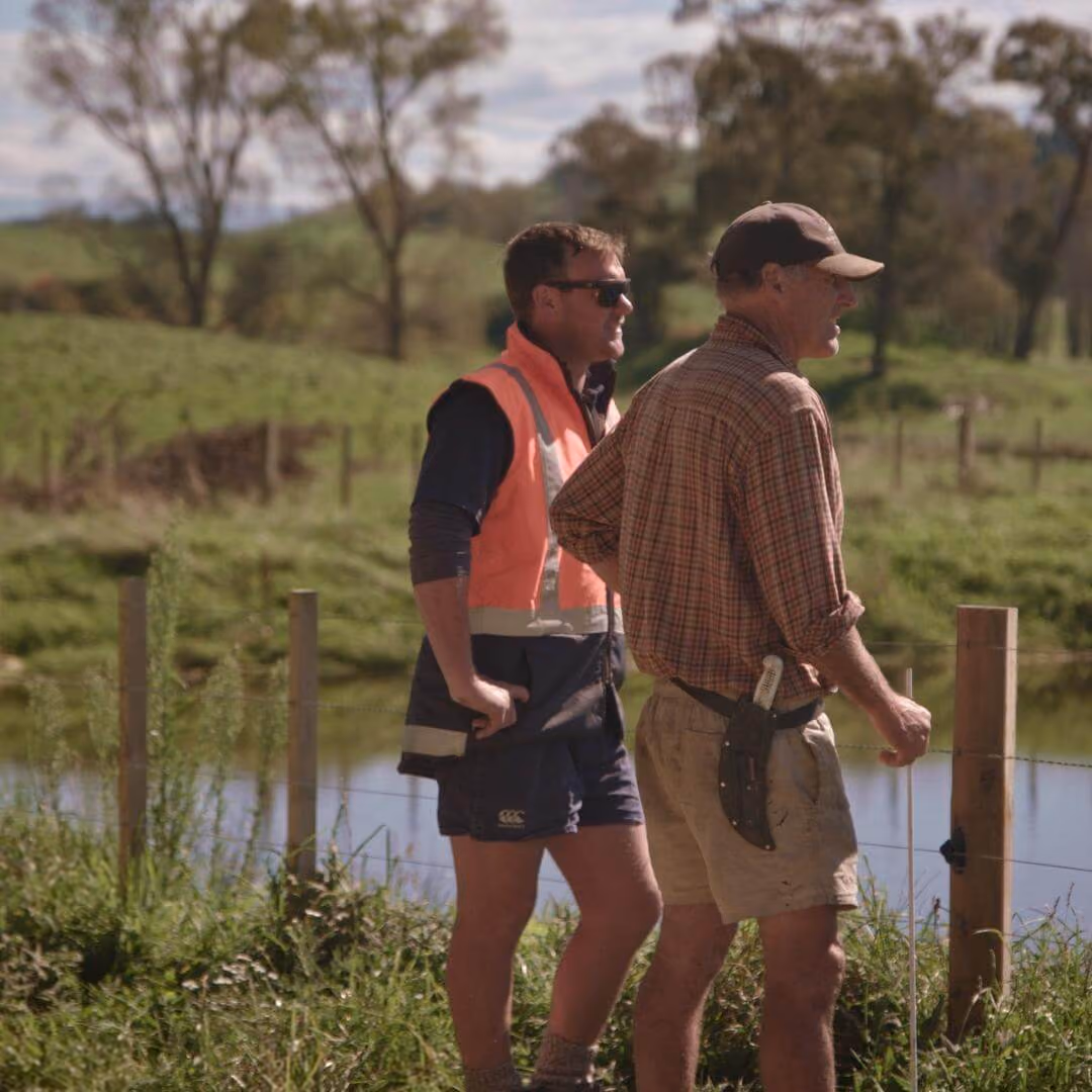 WaterForce staff discussing a stock-water installation