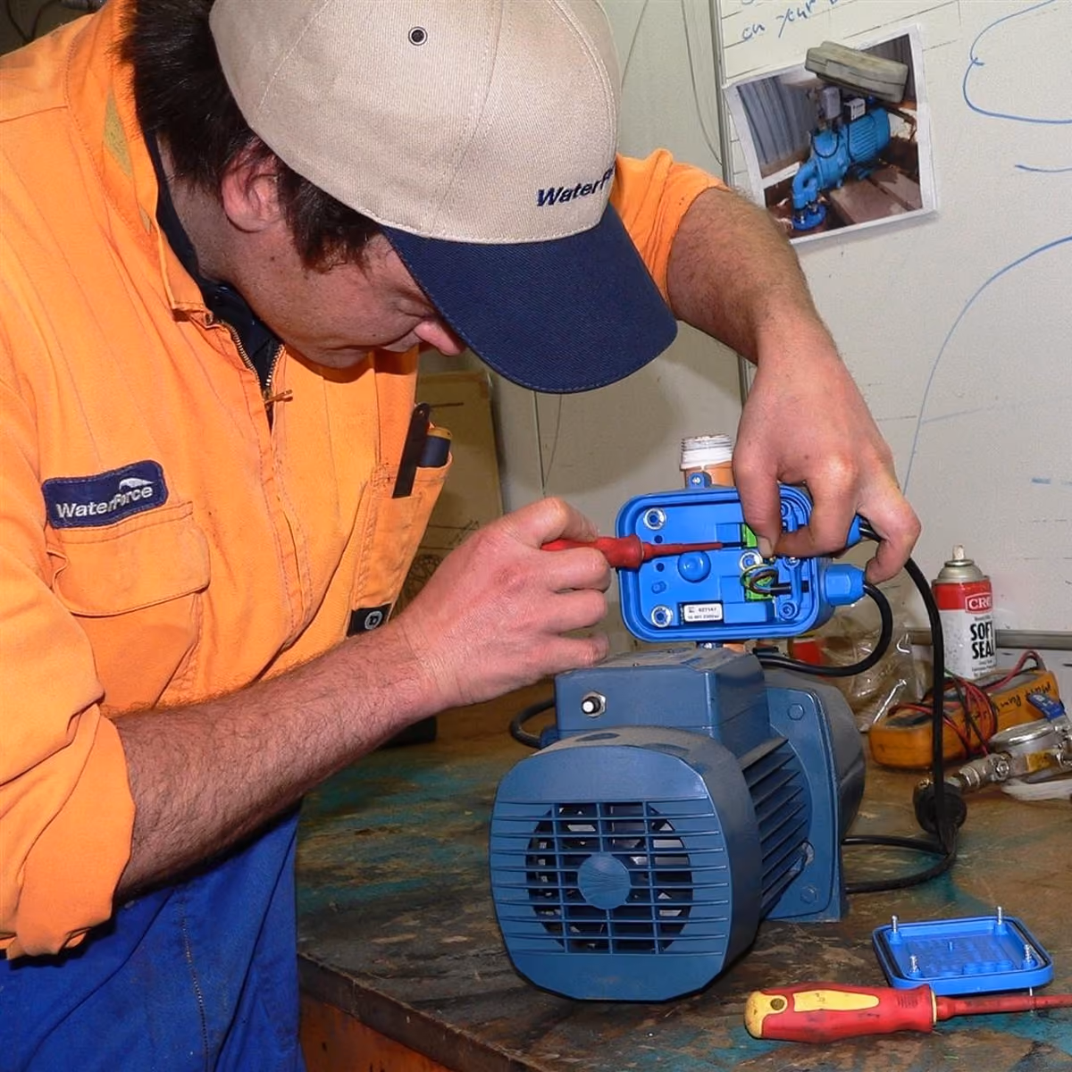 WaterForce technician servicing a water pump