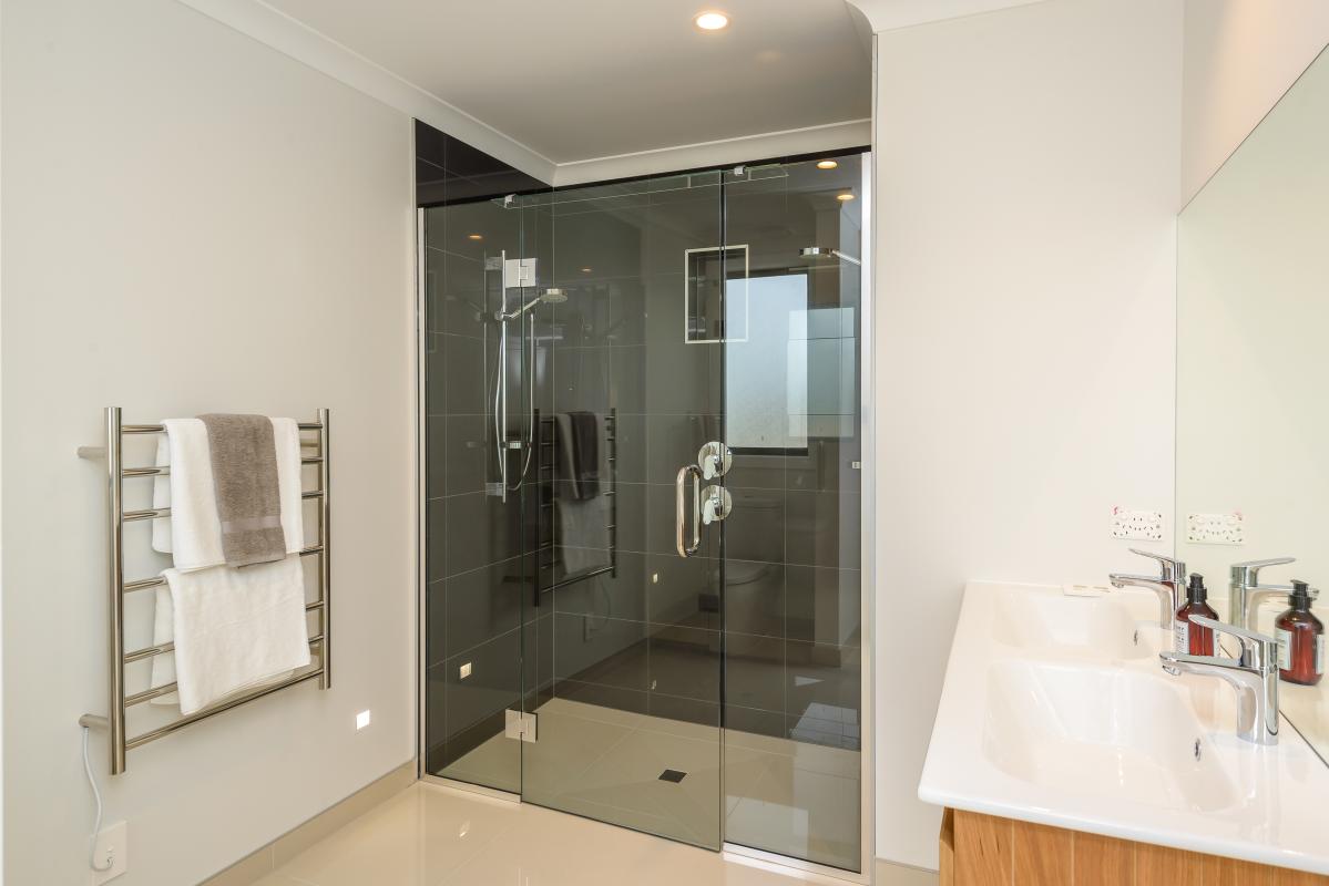 Interior entryway with white walls, built-in joinery and natural light