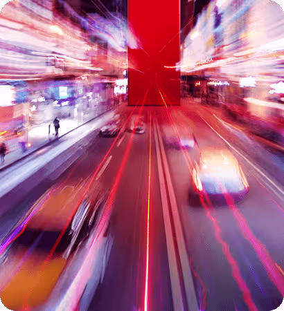 Lenovo CES campaign visual featuring dynamic city traffic and vertical red brand graphic.