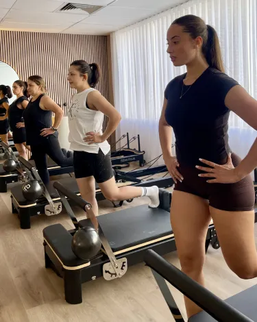 Two women tapping each other in respect