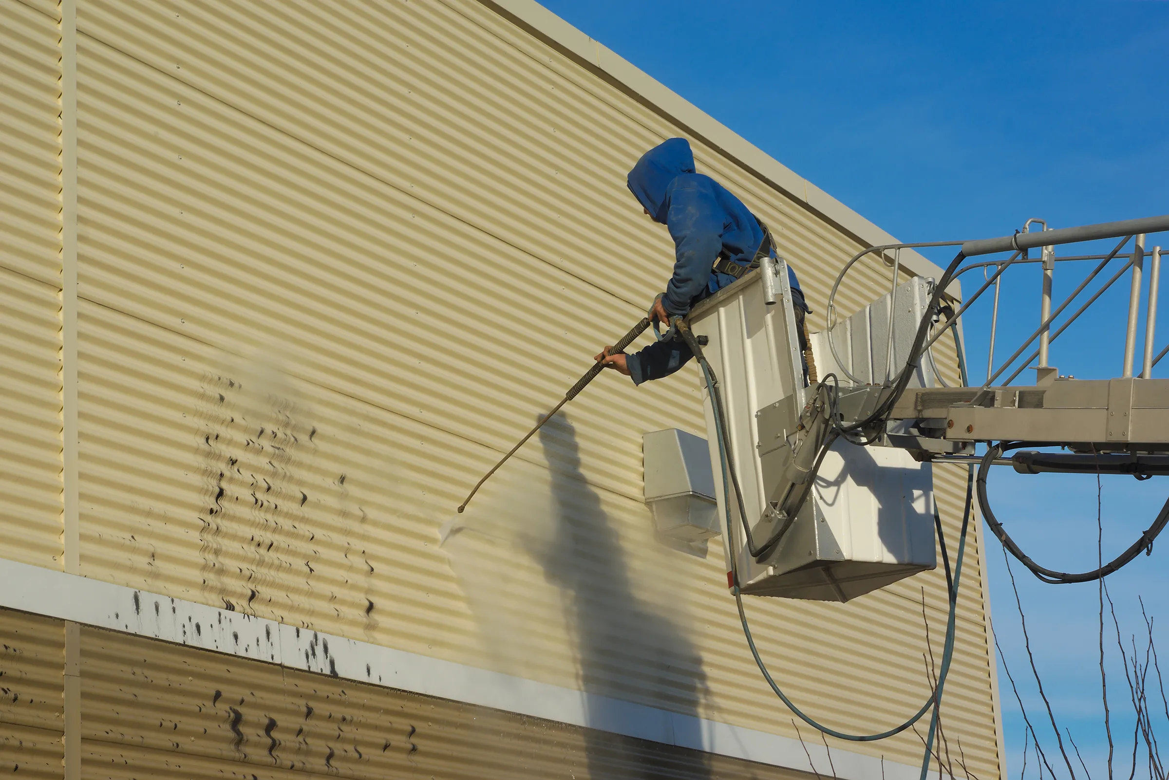 commercial building exterior soft wash black algae and graffiti removal