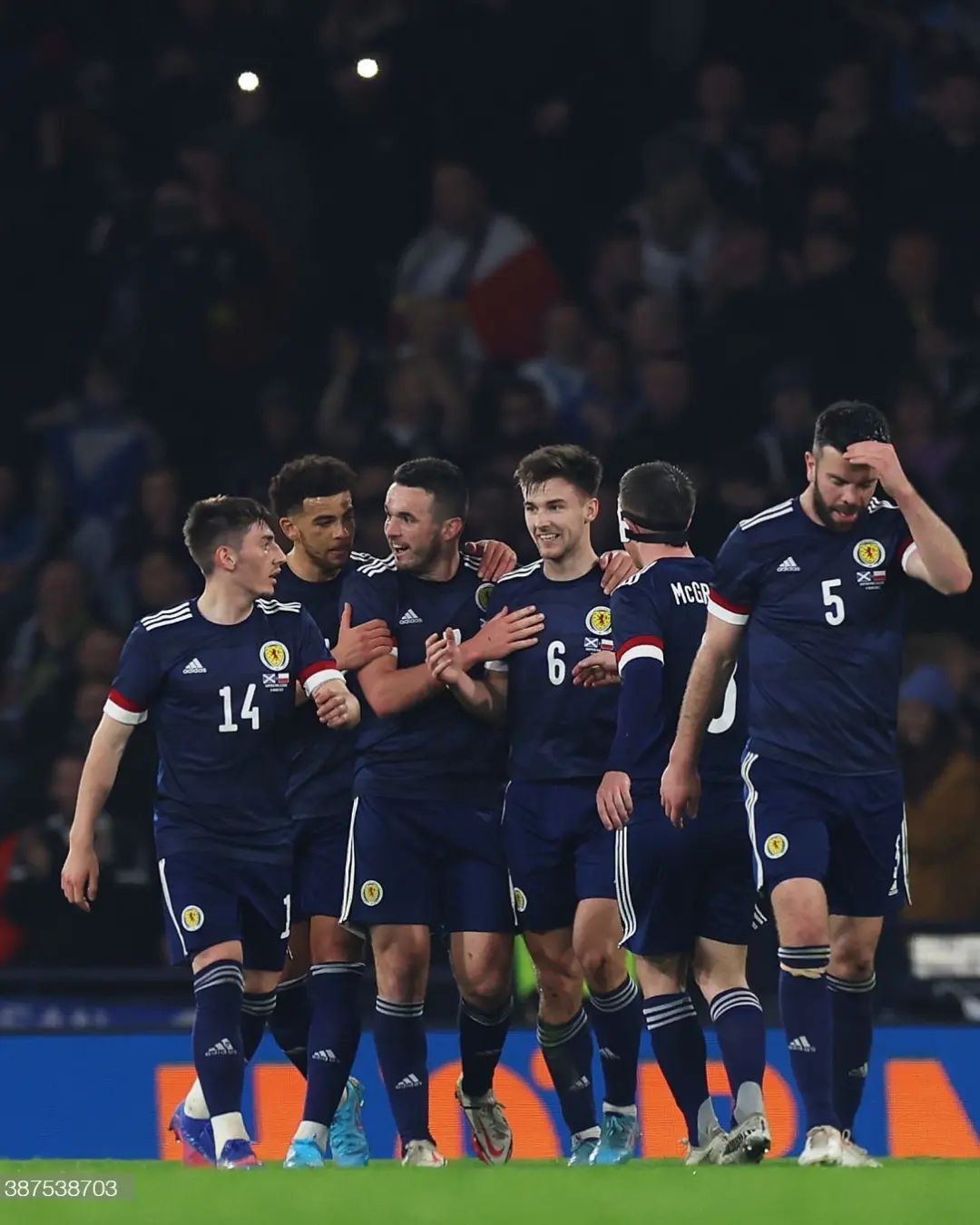 Scotland national football team celebrating on the pitch